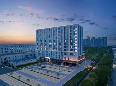 Wuhan New Binkai International Hotel Jiangxia Bridge CRRC Branch Отели рядом с достопримечательностью «Wuhan Donghu University»