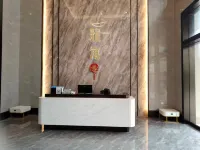 Xinxin Homestay (Yifeng Shidai Square)