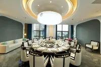Xiuwen Shengzhi Grand Hotel فنادق في شيو ون