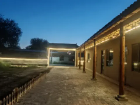 Mulei Hujia Quadrangle Inn Chinese Inn Các khách sạn ở Mori