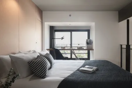 The Bridge House Отели рядом с достопримечательностью «Fudan University(Zhangjiang Campus)»