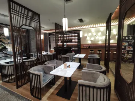 Yijian Guesthouse(Yunnan Nationalities Village) Отели рядом с достопримечательностью «Kunming Xishan Scenic Resort»