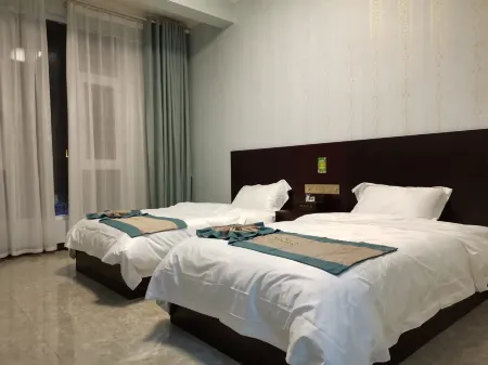 Yuanmou Fuda Hotel Отели рядом с достопримечательностью «Liangshan Passenger Transport Terminal»