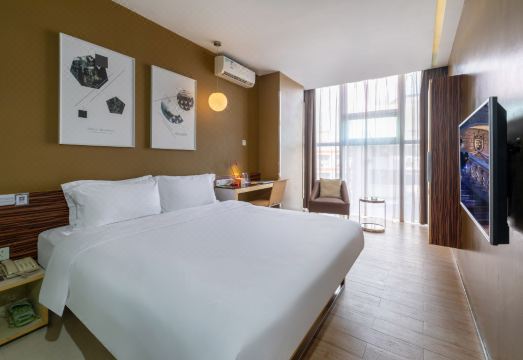 선전 둥먼 컬러 호텔의 깨끗한 침구