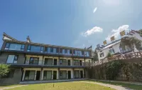 Guantanju Guesthouse Taohua Tan Scenic Area 호텔
