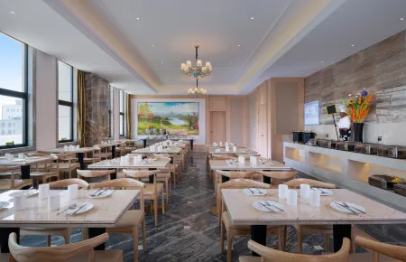 Vienna International Hotel Отели в г. Учуань