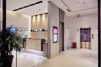 Zhiren Business Hotel (Shanghai Global Harbor Longde Road Subway Station) โรงแรมในพื้นที่ศูนย์การค้า สวนสาธารณะซงชาน