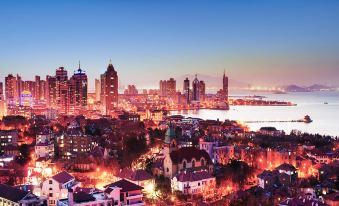 Xinju Sense Apartment (Qingdao Lanshan Bay)