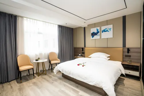 โรงแรมเมิ่ง ยูธ จินเฉวียน จ้าวทง - ที่มีที่จอดรถ