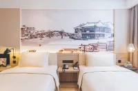 โรงแรมเอทัวร์ เซี่ยงไฮ้ สถานีรถไฟระบบพื้นผิวแม่เหล็กนิวอินเตอร์เนชั่นแนลเอ็กซ์โปเซ็นเตอร์ โรงแรมใกล้สําหรับพื้นที่ของฟ้าสวรรค์