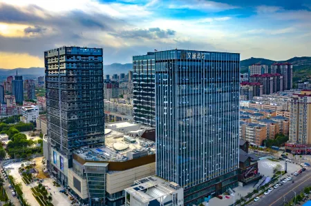 Xinmi Wenlan Hotel Отели в г. Синьми