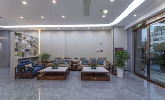 Ganglong Apartment Hotel (Zhuji Meirencheng International Trade City)