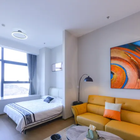 Dalian Baixuan Hotel Apartment (Xinghai Square)