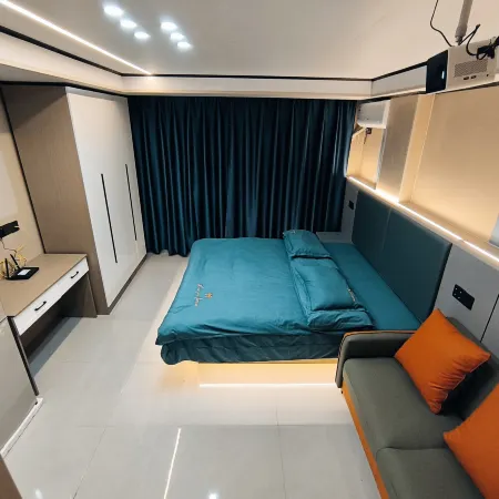 Hengdian Chunai Smart Apartment (Mingqing Gongyuan Branch)