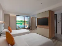 Mile Huquan Shuixiang Haofeng Wyndham Hot Spring Hotel فنادق في مي له