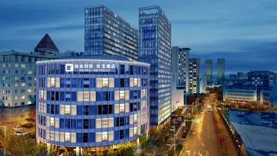 รูบี้โรส เรเซน รีทรีต โรงแรมใกล้ศูนย์กีฬาชิงเต่าสนามกีฬา