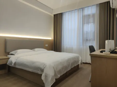 Xinyang Yuelai Inn โรงแรมใน