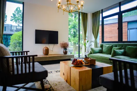 Youran Jiuxi Resort Отели рядом с достопримечательностью «Yu Village Cultural Market»