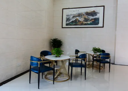 Aijia Business Hotel Отели рядом с достопримечательностью «Quangang Botanical Garden»