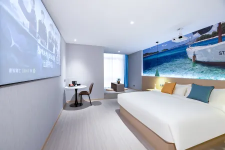 Meiyi Hotel (Zhangjiagang Jinfeng Shagang Branch) Отели рядом с достопримечательностью «Zhangjiagang Campus， the City Vocational College of Jiangsu (Binjiang Avenue)»