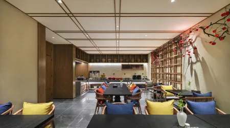 QIANNA HOTEL (Tengzhou Xueyuan Road Branch) Отели рядом с достопримечательностью «Tengzhoushi Shimin Park»