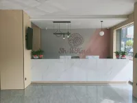 Shell Hotel (Fuyang Central City)