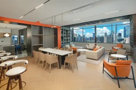 Taigu Huilichengrui Hotel, the Pearl River New Town, Guangzhou Отели рядом с достопримечательностью «Guangdong Polytechnic Normal University Library»