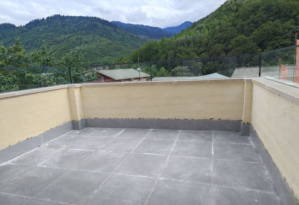 Jiuzhaigou National Park Boye Muge Homestay의 아늑한 객실 이미지