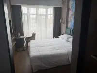 Magnolia Business Hotel (Yantai Longkou Heping Road Branch) Hotels in Longkou