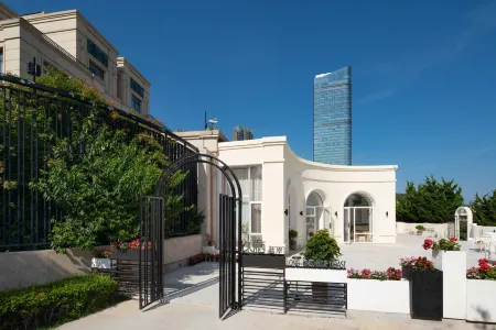 Dalian Jiuqi Blue Coast B&B Отели рядом с достопримечательностью «Xinghai Square Recreation Ground»