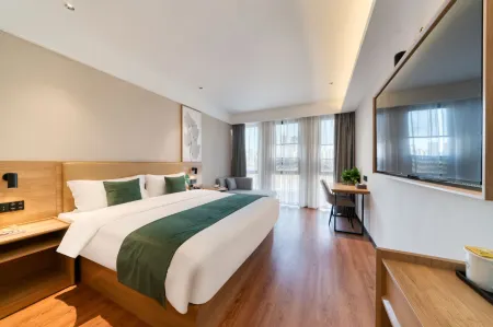 Elong Anyun Hotel (Shangrao Wanda Plaza Shuangta Park) Отели рядом с достопримечательностью «Shangrao Botanical Garden»