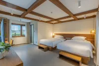 HeMu xinfuyuanzi Hotel a Burqin