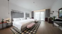 Yanguan Chaolezhicheng Shuishi Hotel