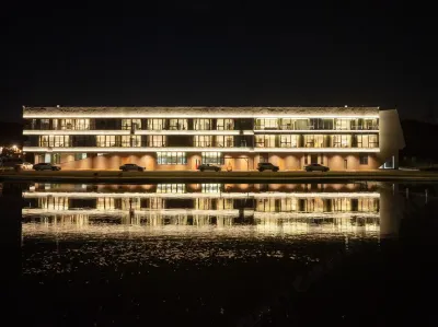 Peach Resort Hotel (Huzhou Longchumei Canyon Adventure Rafting Scenic Area) Các khách sạn ở Xisai Mountain Tourist Resort