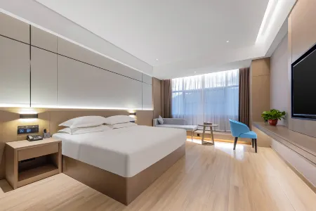 Xipu Hotel (Enshi Airport Railway Station Branch) Отели рядом со станцией Enshi Railway Station