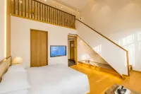 Floral Hotel·Luxury Yunben Hotel (Weihai Huancuilou Shop) Hôtels à : Weihai