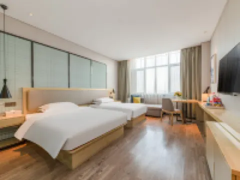 YiYueShangHe Hotel (Linqu Quanfu yuan Zhongbai building shop Hoteles en Condado de Linqu