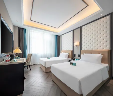 Xana Hotelle Hotel (Haicheng Railway Station Binhe Xi Road) Отели рядом с достопримечательностью «Kuixing Building»