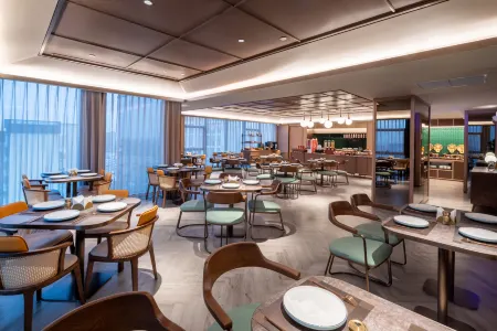 Orange Hotel (Kunshan Vientiane Hui Branch) Отели рядом с достопримечательностью «Dinas Load and Unload Marina»