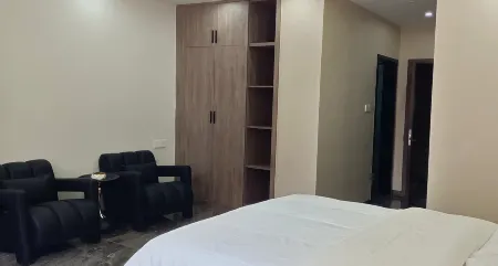 Juyi Ge Hotel Отели в г. Таонань
