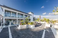 Dali Sanjiuyuan Seaview Courtyard Inn (Erhai Ecological Corridor Branch) Отели в г. Верхний отрезок западной части живописной местности озера Эрхай