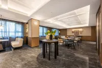 โรงแรม Manxin ทุ่งหญ้าท้องฟ้านาลาที - ที่มีบาร์