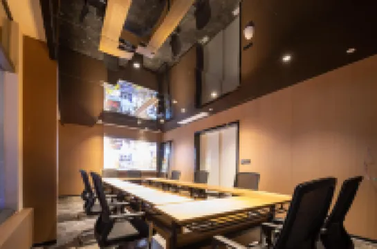 Bairan Private Hot Spring Smart Cinema Design Hotel (Xingyi Jushan Square Huijin Center) โรงแรมในซิงอี้