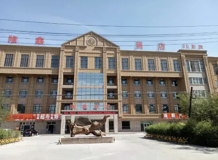 Longxin Hotel (Shihezi 147 Tuanshihutan Branch)