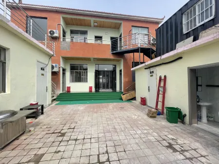 Yuqian Hotel Отели в г. Сишуй