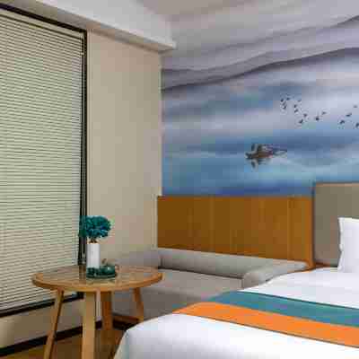 曼居酒店（海南店） Rooms