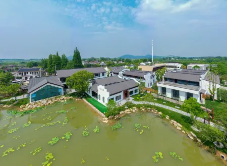 Hefei Feidong Yuyueshanfang Homestay Отели рядом с достопримечательностью «(Wenji Service Area) Feidong Station Wenji Branch»