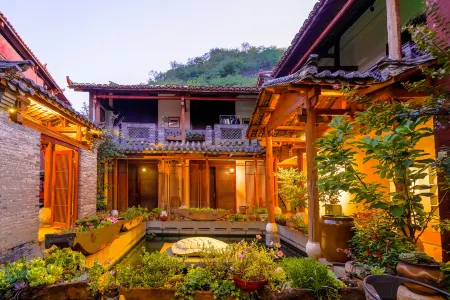 Puzhehei Manpin Huafang Inn Отели рядом с достопримечательностью «Fairy Cave»