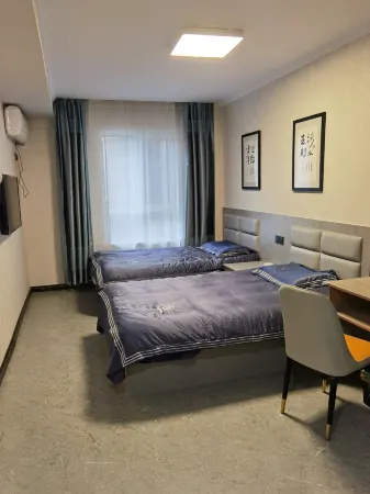 Xinlongmen Inn Отели рядом с достопримечательностью «Heilongjiang Child Normal University Gaodeng Zhuanke School»