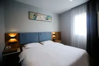 Home Inn Pebble Hotel (Linyi Taisheng Square) Отели в г. Линьи